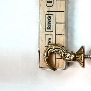 Alzapaño pequeño hierro dorado 3,5 cm - 4